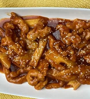 Куриное филе с ананасом в сладком соусе